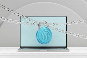 Laptop computer secured with a padlock and chain, representing data security and fraud protection